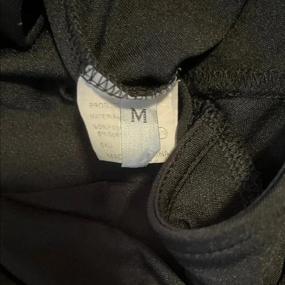 Elegant Black Sleeveless Wide-Leg Jumpsuit - Picture 2 of 3